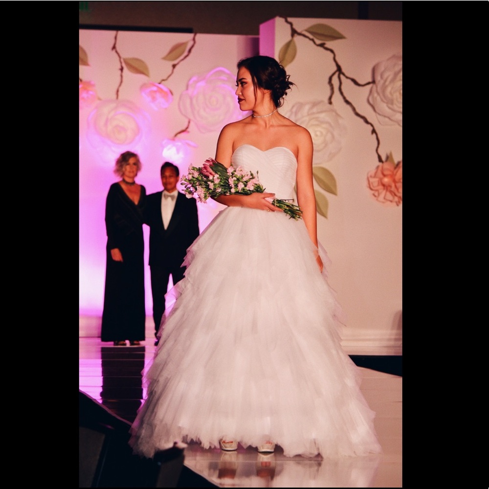 White ball gown wedding dress with hoop skirt